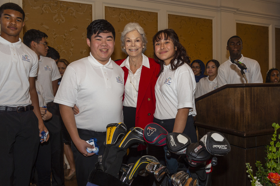 Janice-McNair-with-First-Tee-winners-of-golf-clubs-and-golf-bags-formerly-belonging-to-Robert-C.-McNair