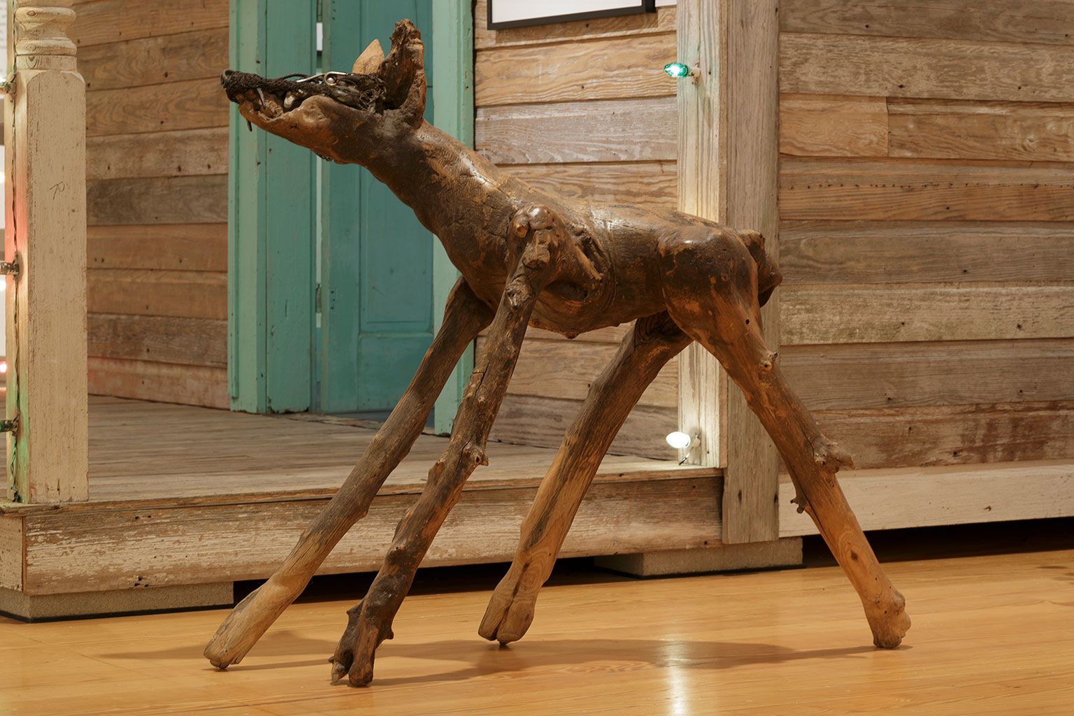 2-Jesse-Lott-“Junkyard-Dog”-1990s-Found-wood-mixed-media.-Image-from-Station’s-website