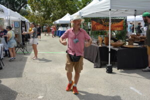 5) Jeff Lung, a figurative abstract expressionist, walks the September First Saturday Arts Market, kicking off the season. He won’t attend October 4. (Photo by Natalie S 5) Jeff Lung, a figurative abstract expressionist, walks the September First Saturday Arts Market, kicking off the season. He won’t attend October 4. (Photo by Natalie S