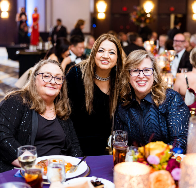 Margaret Oster and Amanda McMillian of United Way with Sheroo Mukhtiar photo by Hung L. Truong