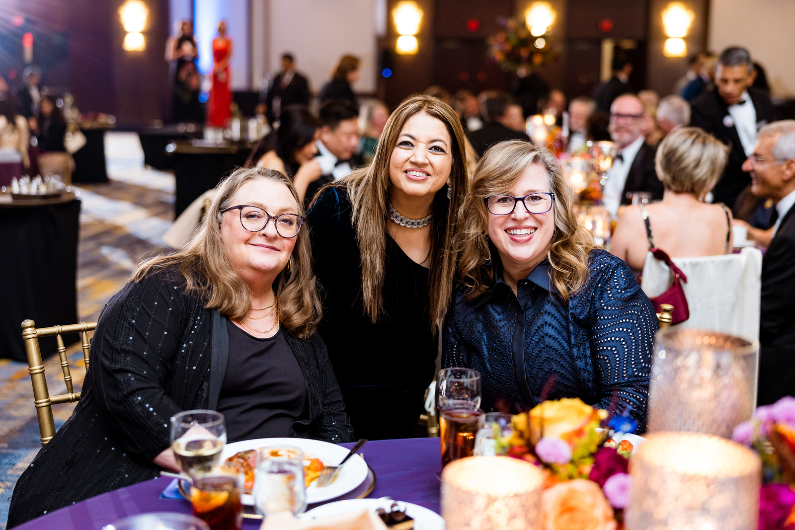 Margaret Oster and Amanda McMillian of United Way with Sheroo Mukhtiar photo by Hung L. Truong