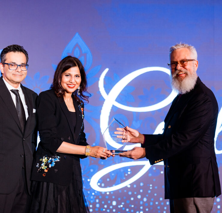 Shaukat and Nihala Zakaria with the Right Reverend C. Andrew Doyle photo by Hung L. Truong