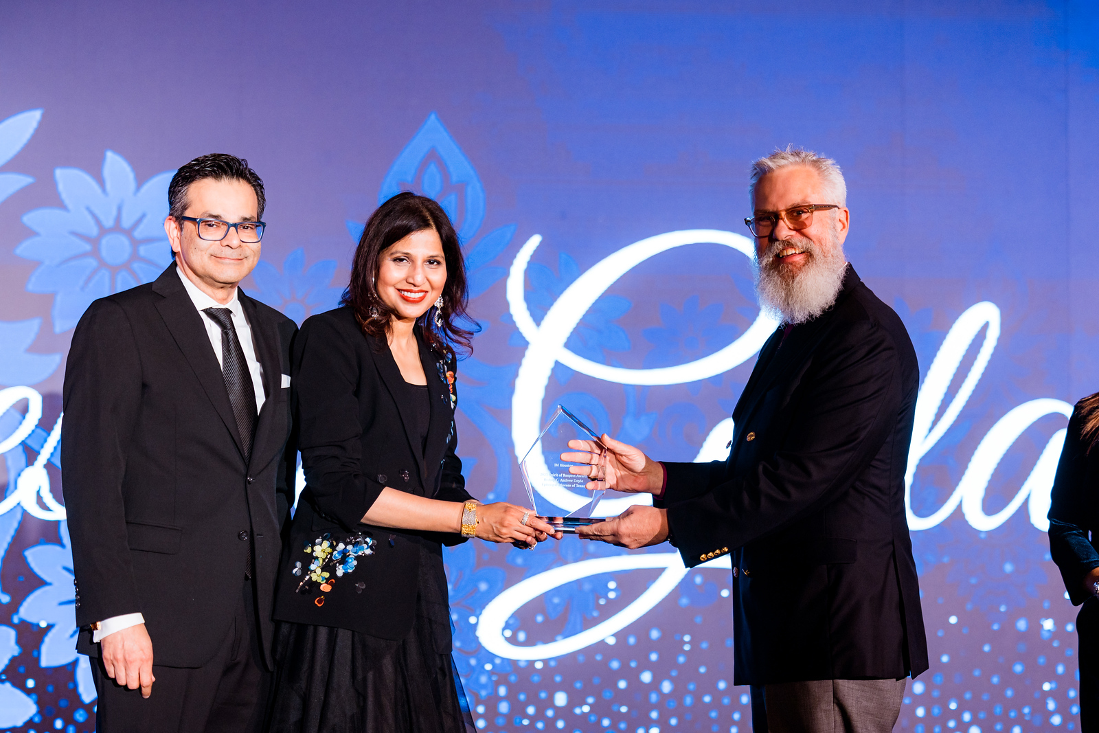 Shaukat and Nihala Zakaria with the Right Reverend C. Andrew Doyle photo by Hung L. Truong