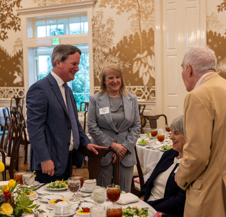 LHSAA Photo 13 (L to R) Honorees Barret Reasoner, class of 1982, Macy Reason Stokes, class of 1985, chat with Karen Comiskey and Gus Comiskey, class of 1958