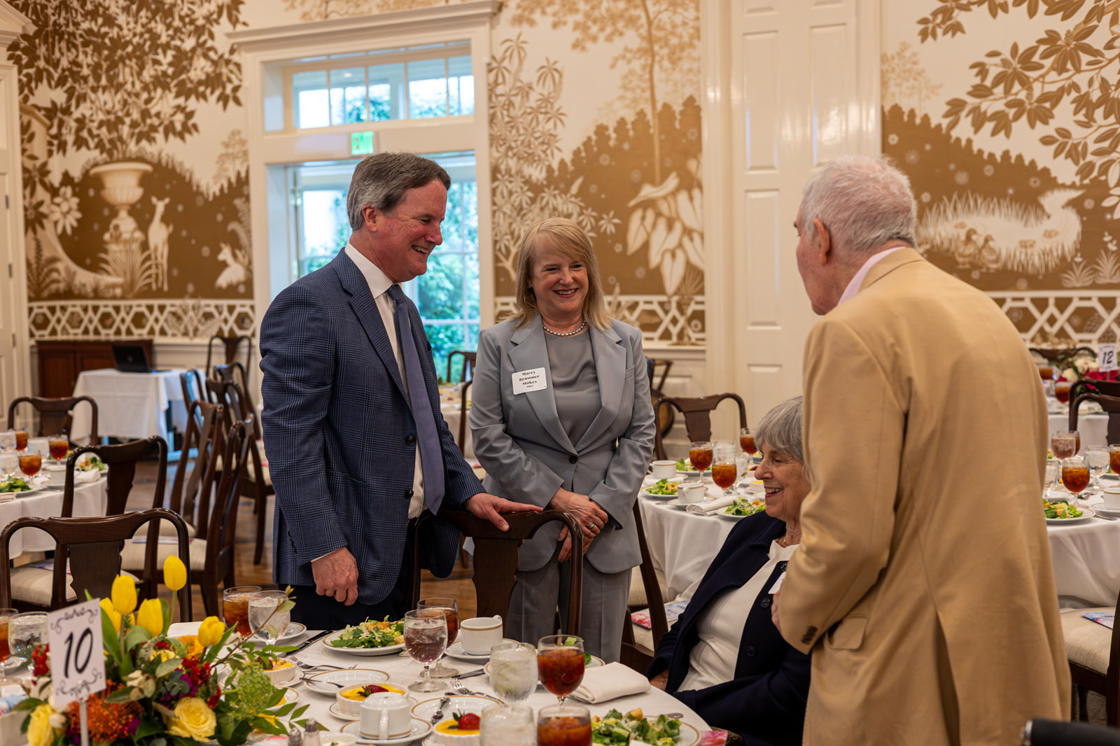 LHSAA Photo 13 (L to R) Honorees Barret Reasoner, class of 1982, Macy Reason Stokes, class of 1985, chat with Karen Comiskey and Gus Comiskey, class of 1958
