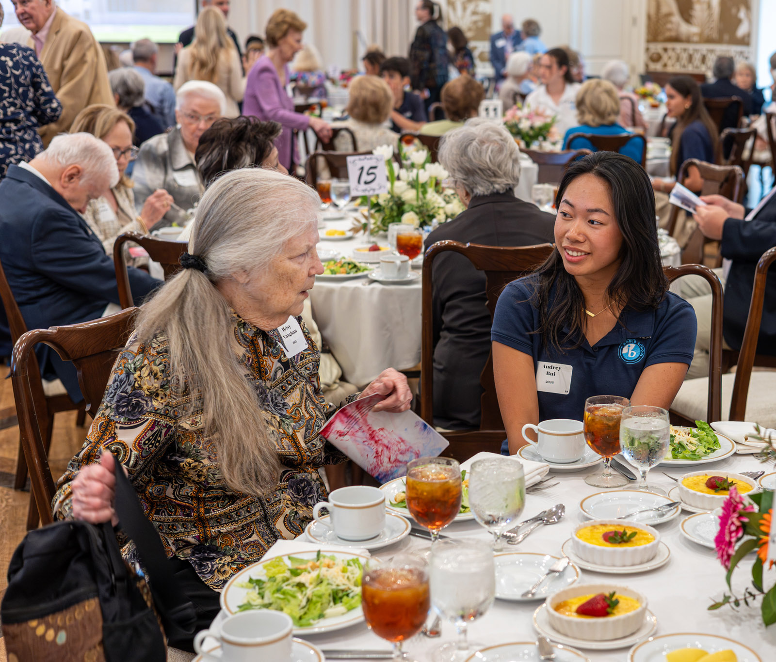 LHSAA Photo 23 – (L to R) Betsy Vauhgan, class of 1961, chats with Lamar Senior and Girls Varsity Golf player Audrey Bui