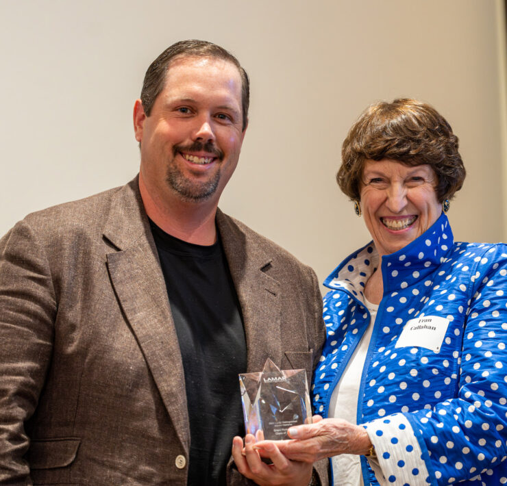 LHSAA Photo 24 – (L to R) Grant Pinkerton, class of 2007, receiving his Reach for the Stars Award from the Lamar Alumni Association Founder and Board Member, Fran Callahan