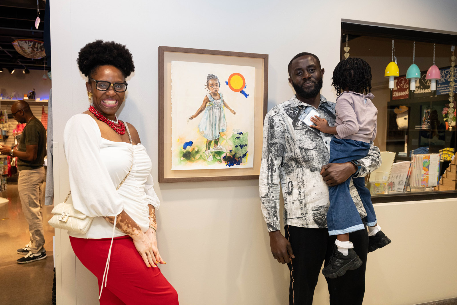 Crystal Walter, Mathieu JN Baptiste and daughter by TreVoy Kelly